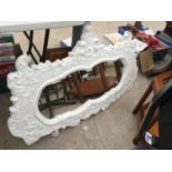 A WHITE MODERN ROCOCCO STYLE MIRROR