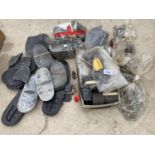 A LARGE ASSORTMENT OF SHOE SOLES AND BELT BUCKLES