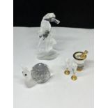 THREE SWAROVSKI CRYSTALS TO INCLUDE A SEAHORSE, SNAIL AND CHAMPAGNE BUCKET WITH BOTTLE AND FLUTES