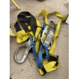 AN ASSORTMENT OF CLIMBING CLIPS AND HARNESSES ETC