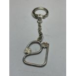 A HALLMARKED BIRMINGHAM SILVER 21 KEY RING WITH FOUR LEAF CLOVER DECORATION