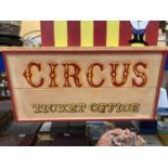 A PAINTED WOODEN CIRCUS TICKET OFFICE SIGN 60CM X 30CM