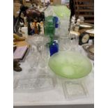 A QUANTITY OF GLASSWARE TO INCLUDE A FROSTED GREEN BOWL, A SWING MIRROR, CHAMPAGNE FLUTES,