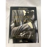 A FIRST EDITION DRESSING THE MAN BY ALAN FLUSSER