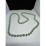 A GREEN JADE NECKLACE