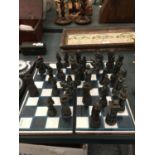 A COMPLETE CHESS SET ON BOARD WITH RESIN 'NAPOLEONIC' FIGURES - SOME A/F