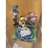 THREE WALT DISNEY SHOWCASE FIGURES TO INCLUDE ALICE IN WONDERLAND, THE MAD HATTER AND THE CHESHIRE