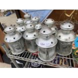 A COLLECTION OF EIGHT DECORATIVE TEA LIGHT LANTERNS