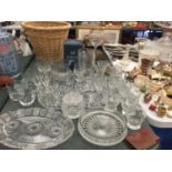 A LARGE QUANTITY OF CUT GLASS ITEMS TO INCLUDE VASES, BOWLS, TUMBLERS, SHERRY GLASSES, ETC