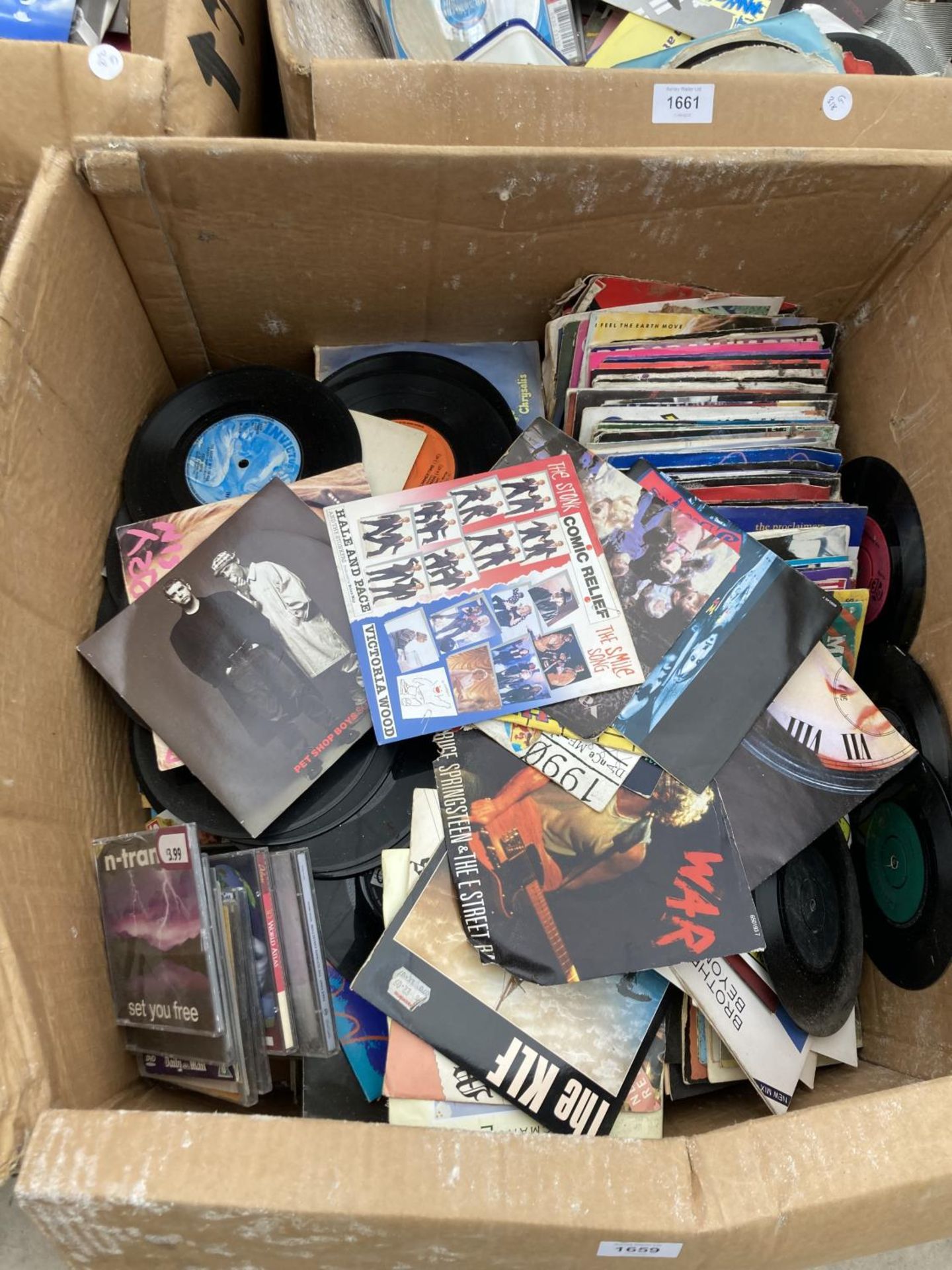 A BOX OF SINGLE RECORDS