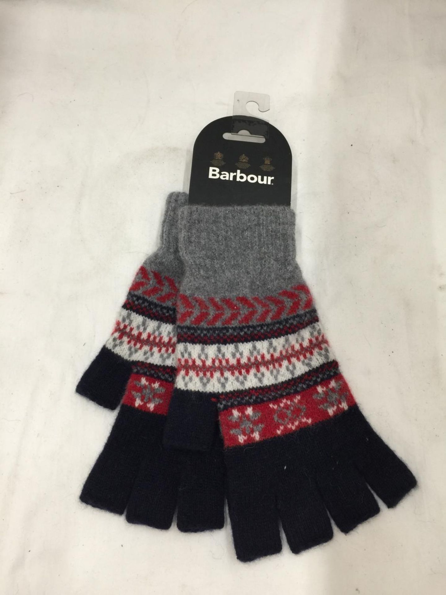A PAIR OF AS NEW BARBOUR FINGERLESS GLOVES