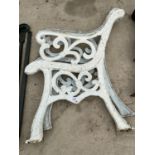 A PAIR OF WHITE PAINTED DECORATIVE CAST BENCH ENDS