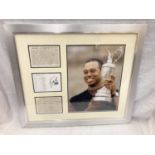 A FRAMED AUGUSTA NATIONAL GOLF CLUB SCORE CARD SIGNED BY TIGER WOODS WITH CERTIFICATE OF