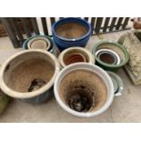 AN ASSORTMENT OF GLAZED AND PAINTED GARDEN POTS