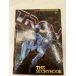 A FIRST EDITION TRON THE STORYBOOK BY LAWRENCE WEINBERG