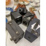 A QUANTITY OF VINTAGE CAMERAS INCLUDING BOX BROWNIES AND A PAIR OF BINOCULARS