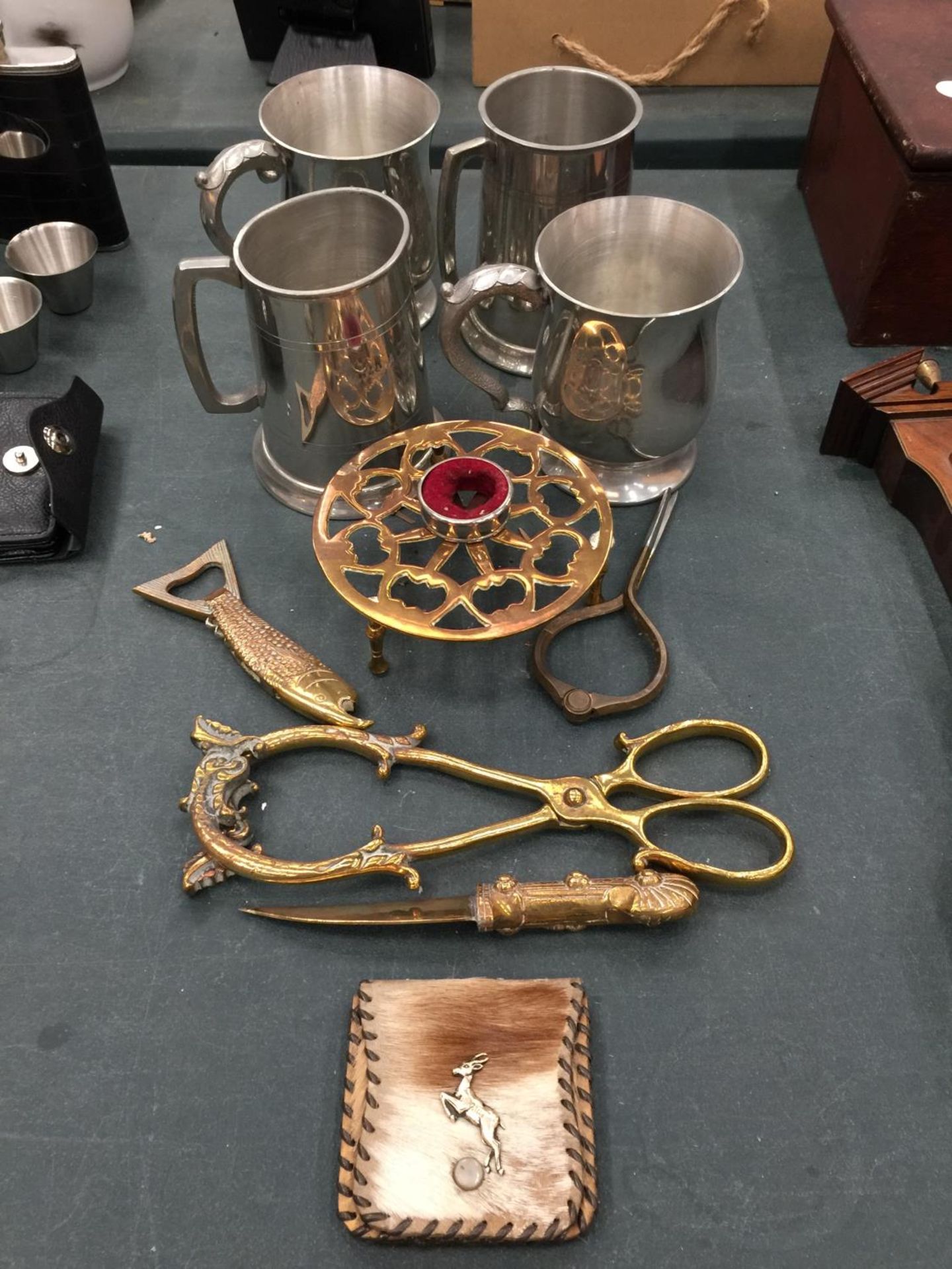 FOUR SILVER PLATED TANKARDS PLUS BRASSWARE INCLUDING TONGS, A KNIFE, BOTTLE OPENER, ETC
