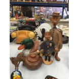 A COLLECTION OF CARVED TREEN ITEMS INCLUDING A LARGE DUCK, ANIMALS, FIGURES, ETC