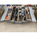 A METAL TOOL BOX WITH AN ASSORTMENT OF TOOLS TO INCLUDE SPANNERS, PLIERS AND SET SQUARES ETC