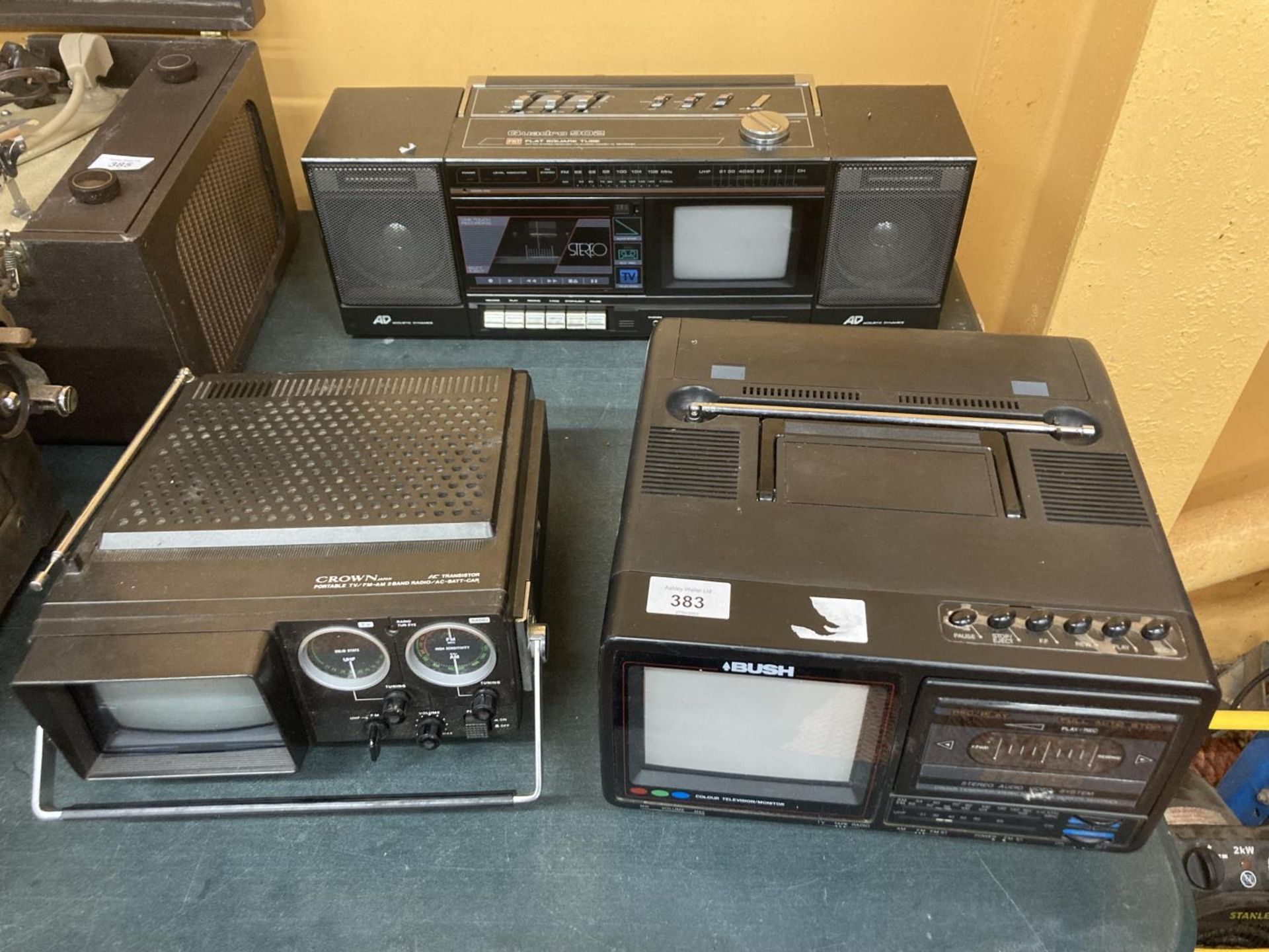 THREE RETRO PPORTABLE TV AND CASSETTE RECORDERS TO INCLUDE GOODMANS QUADRO 902 AND A BUSH AND