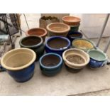 AN ASSORTMENT OF GLAZED, PAINTED AND TERRACOTTA PLANTERS