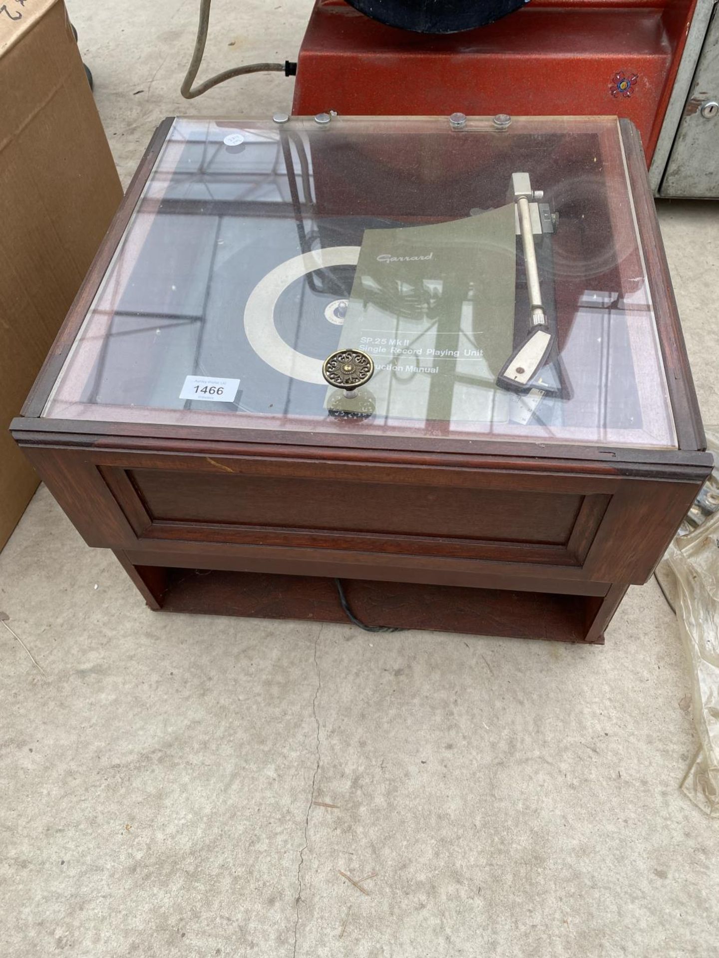 A WOODEN STEREO UNIT WITH A GARRARD SP.25 MK11 RECORD DECK