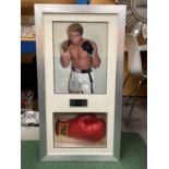 A FRAMED EVERLAST BOXING GLOVE SIGNED BY MUHAMMAD ALI