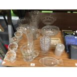 A COLLECTION OF GLASSWARE INCLUDING VASES, DESSERT BOWLS, BOWLS, ETC