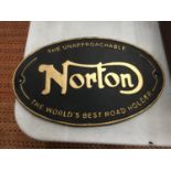 A CAST BLACK AND GOLD MORTON SIGN LENGTH 32.5CM