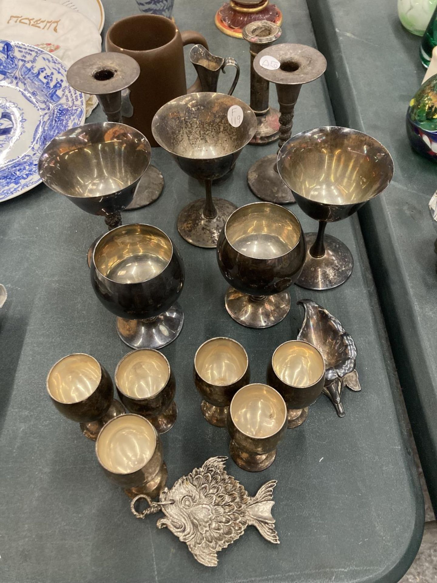 VARIOUS METAL ITEMS TO INCLUDE STAINLESS STEEL LARGE AND SMALL GOBLETS, CANDLESTICKS, ETC