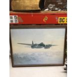 A FRAMED PRINT OF A MILITARY PLANE