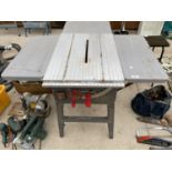 AN ELECTRIC TABLE BENCH SAW