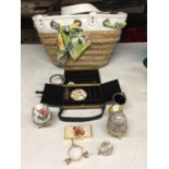 A WICKER BAG CONTAINING A COTY BAG WITH COMPACT AND PERFUME, DECORATIVE EGGS AN EGG CLOCK, ETC