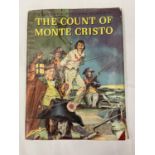 A COPY OF THE COUNT OF MONTE CRISTO BY ALEXANDRE DUMAS AND ILLUSTRATED BY HAMILTON GREENE