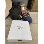 AN ASSORTMENT OF CAMPING ITEMS TO INCLUDE A SLEEPING BAG, A STOVE AND A PAIR OF NEW BRASHER SIZE 9