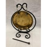 A WROUGHT IRON AND BRASS GONG
