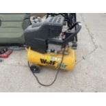 A WOLF AIR COMPRESSOR BELIEVED WORKING BUT NO WARRANTY GIVEN