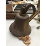 A WALL MOUNTED VINTAGE BRASS BELL