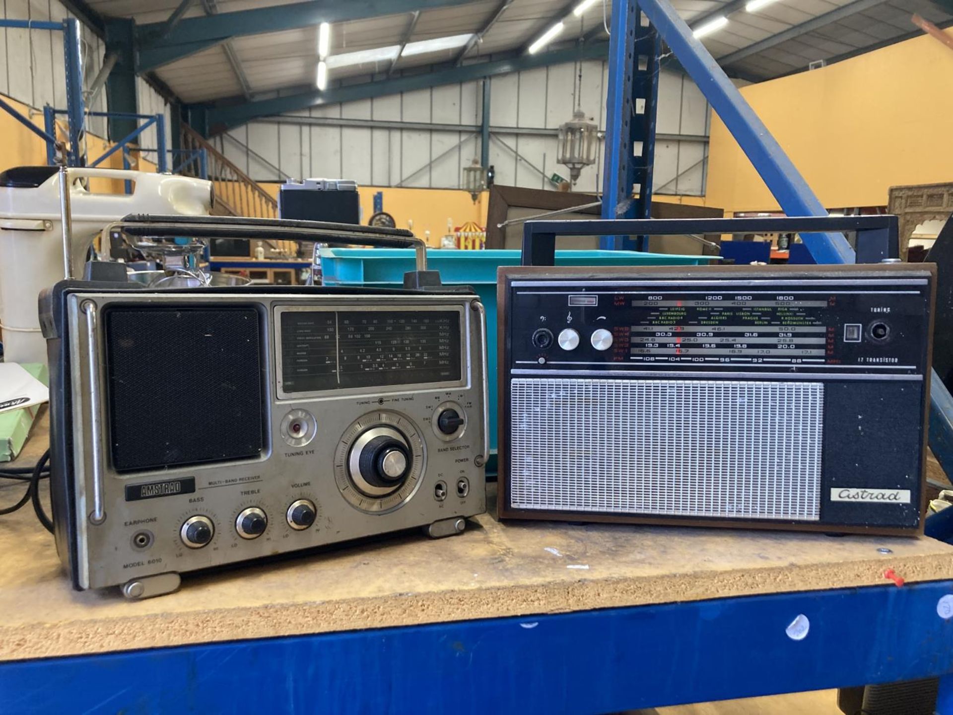 TWO VINTAGE AMSTRAD TRANSISTOR RADIOS CONSISTING OF MODEL6010 AND MODEL F8TR17B205