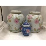 TWO LARGE LIDDED JARS WITH FLORAL DECORATION -GOOD CONDITION PLUS A SMALLER ONE
