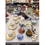 A COLLECTION OF CERAMICS AND CHINA TO INCLUDE CUPS AND SAUCERS, PLATES, COTTAGES, THIMBLES, ETC