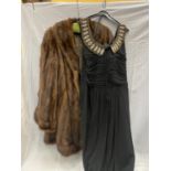 A FUR 3/4 LENGTH JACKET AND A BLACK RUSSELL STUART EVENING DRESS