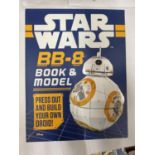 A STAR WARS BB-8 BOOK AND MODEL