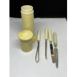 A VINTAGE BAKELITE MANICURE SET