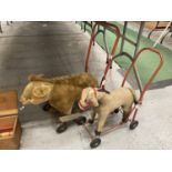 TWO VINTAGE PUSH/RIDE ON TOYS WITH WHEELS, ONE A DONKEY, THE OTHER A BEAR IN WELL LOVED CONDITION