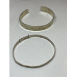 TWO SILVER BANGLES ONE ENGRAVED