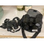 A CASED PAIR OF FIELD BINOCULARS AND A SMALLER PAIR OF WETLAND BINOCULARS