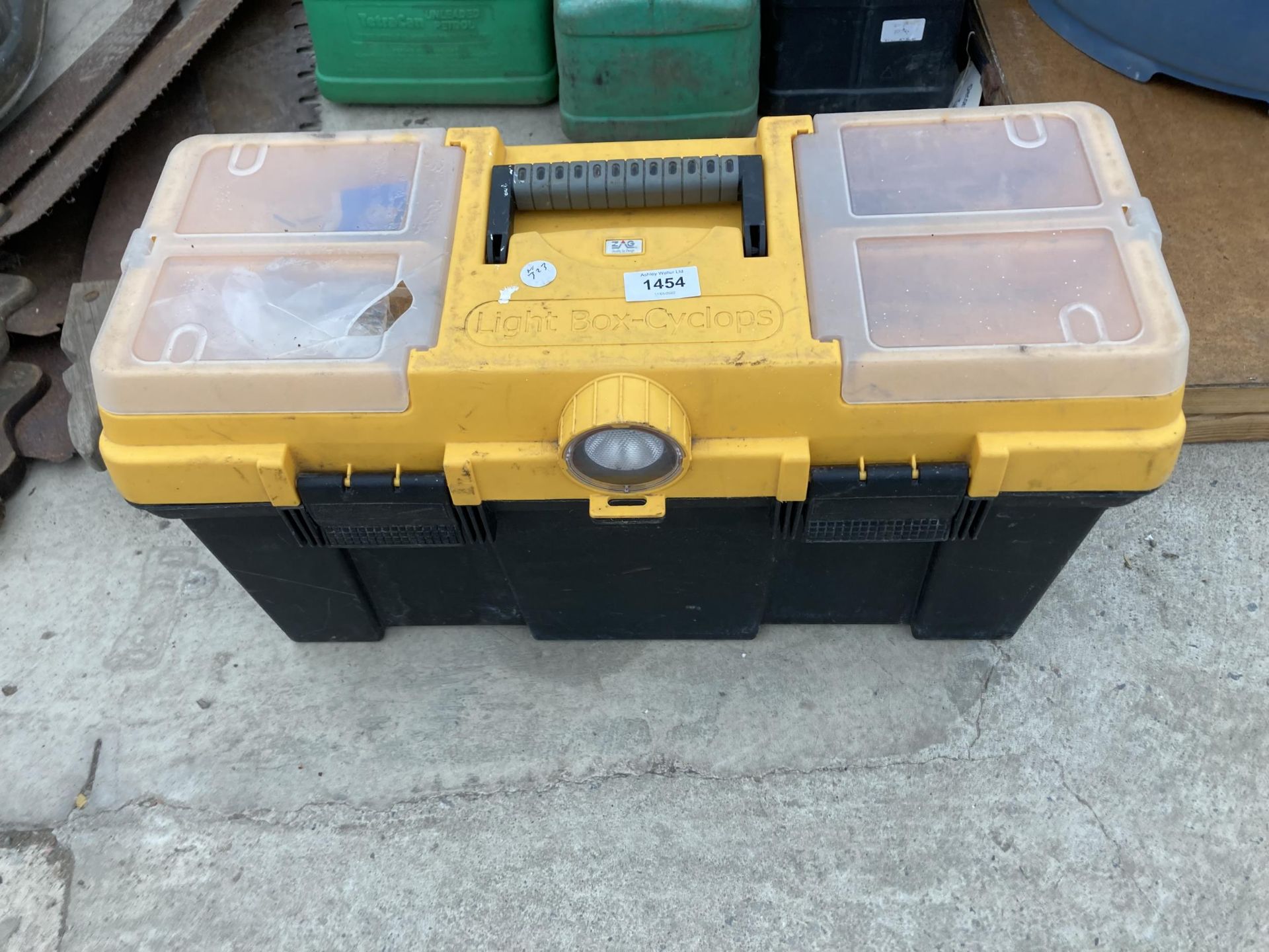 A PLASTIC TOOL BOX CONTAINING SCREW DRIVERS AND SOCKETS ETC