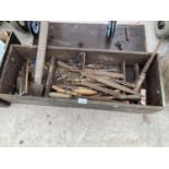 A VINTAGE WOODEN TOOL CHEST CONTAINING AN AXE, FILES AND A SET SQUARE ETC