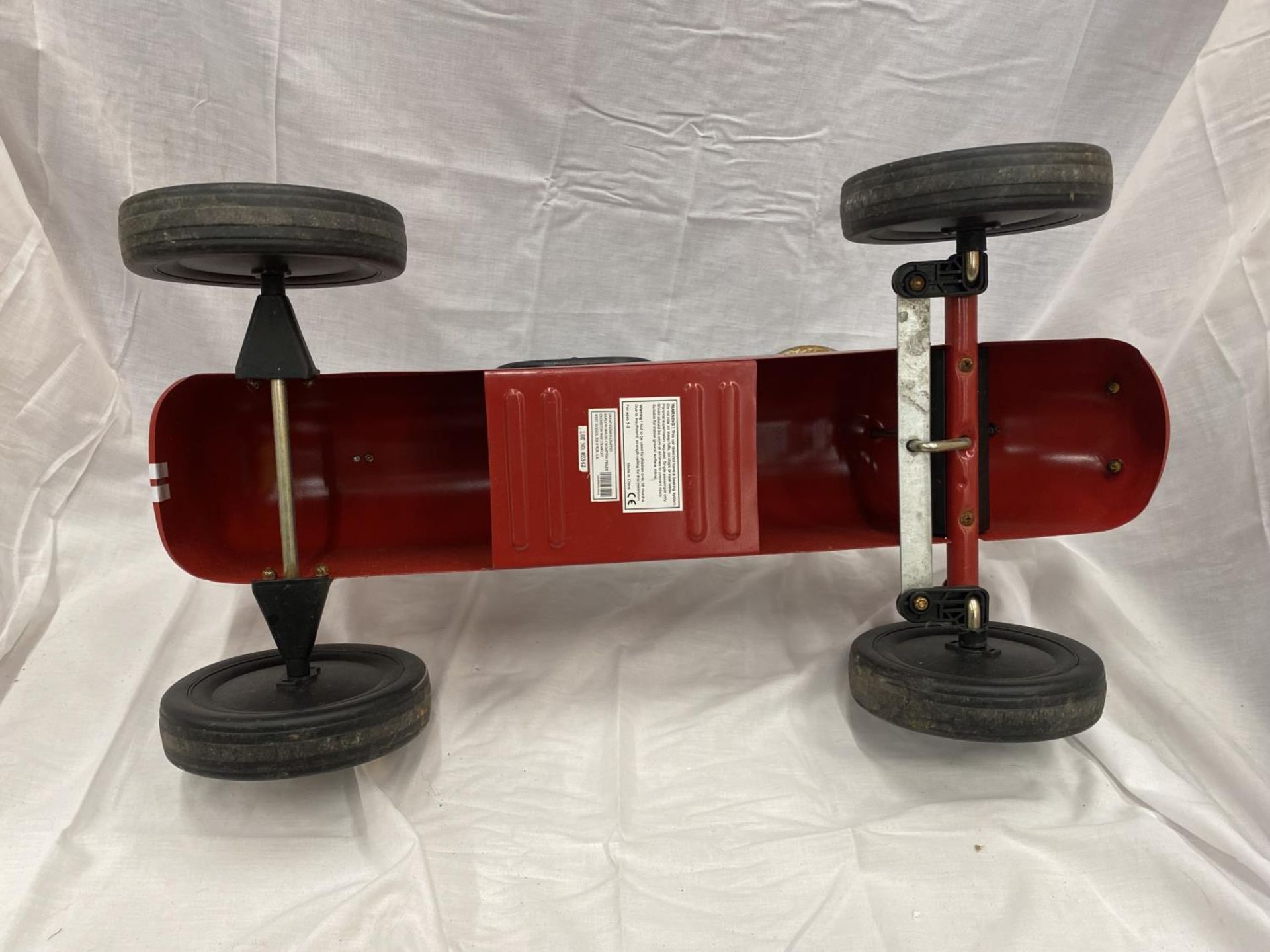 A VINTAGE CHILD'S RIDE-ON PUSH ALONG TIN RACING CAR WITH WORKING STEERING - Image 18 of 18